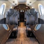 Cessna Citation Ascend — клубная группа кресел со столиками